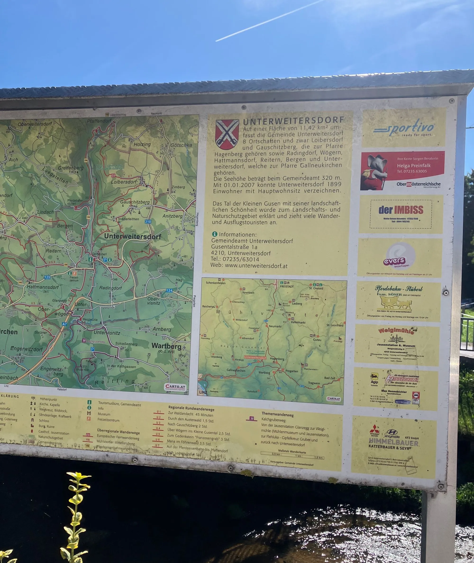 Person checking phone navigation to figure out location