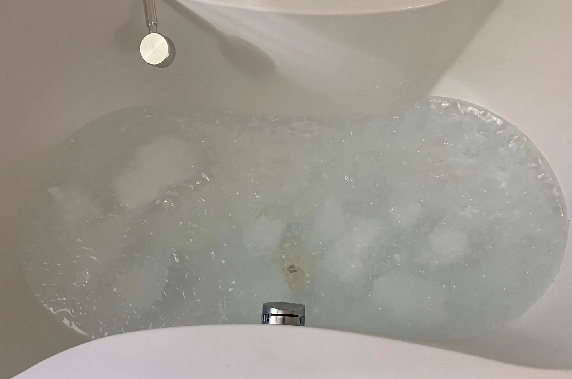 Close-up of ice bath water with ice cubes